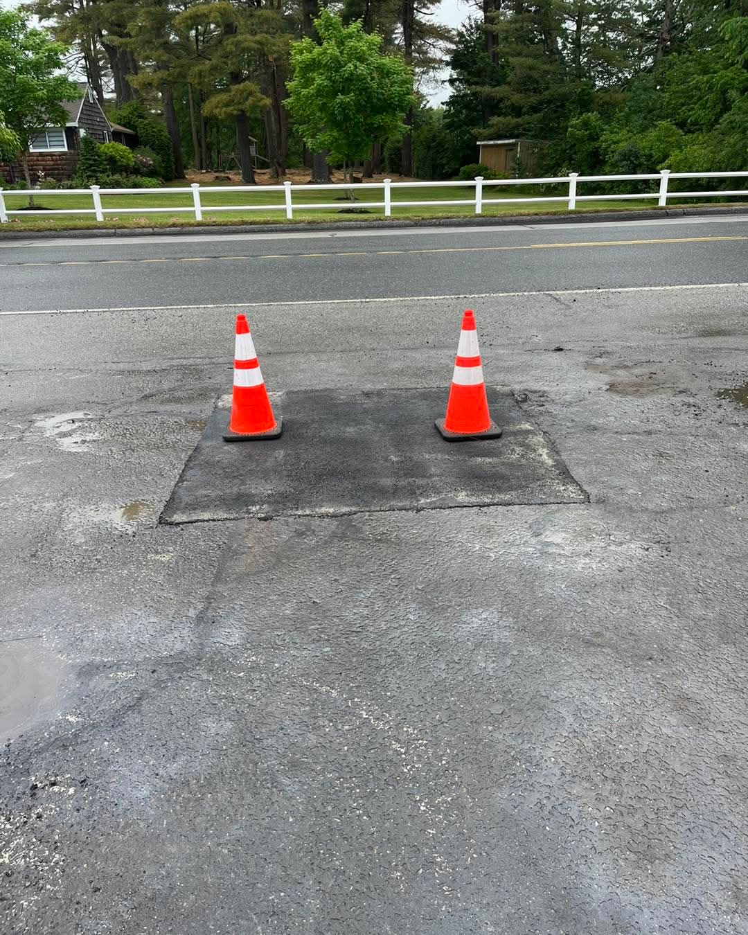 Full-depth hot-mix patch on a deteriorated surface, saw-cut edges, properly compacted